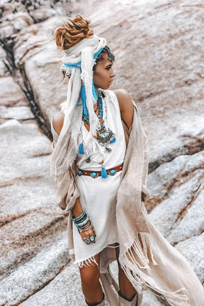 Young tribal style woman with lot of boho accessories outdoors — Stock Photo, Image