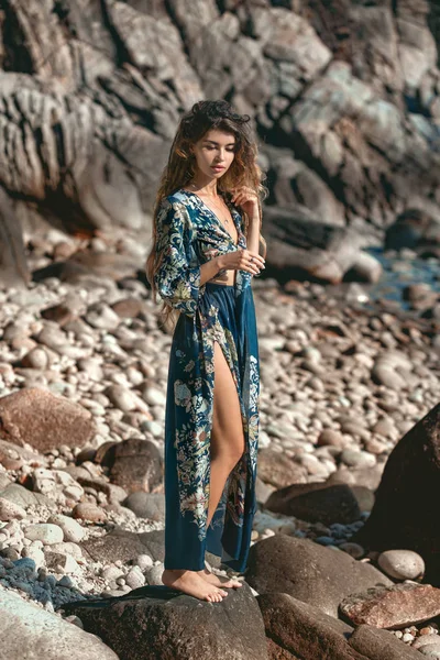 Beautiful young woman in stylish boho dress posing outdoors — Stock Photo, Image