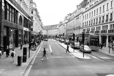 Londra, İngiltere. 21 Mayıs 2014. Regent Street Londra'nın en büyük alışveriş caddeleri Batı tarafında bulunan biridir. 1811 ve 1825, 1895 ile 1927 arasında yeniden arasında inşa edilmiştir.