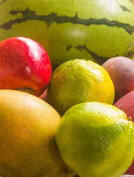 Basket with different colors of fruits