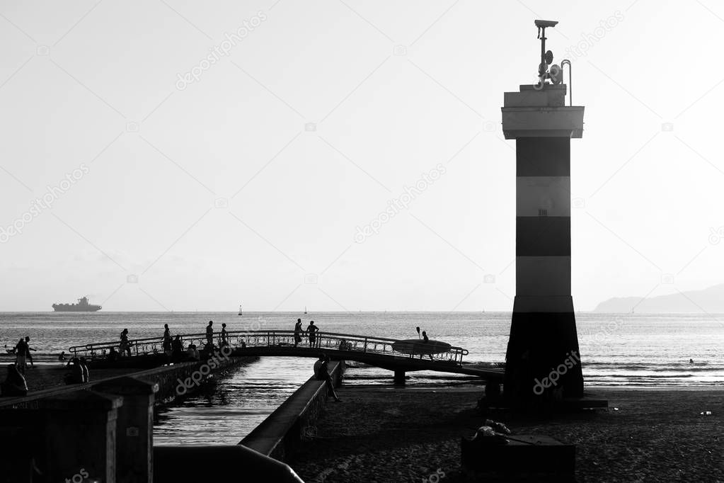 Famous place in the city of Santos, the lighthouse of Channel 6 photographed in late afternoon in black and white.