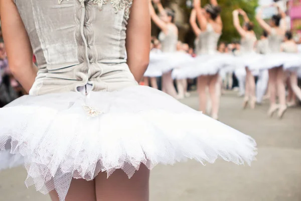 Classic dancers performing on the street to the audience