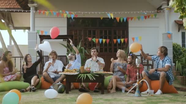 Young friends celebrating festive party — Stock Video