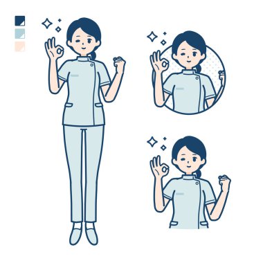 Tamam işareti olan genç bir hemşire kadın.