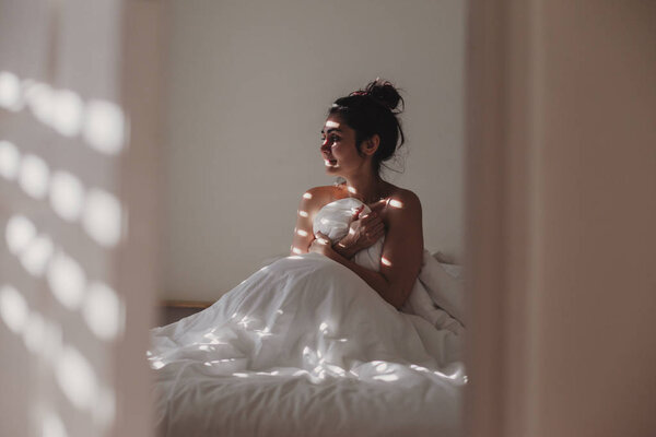 Woman Covered White Sheets Sitting Bed Sun Coming Window Indoors Stock Picture