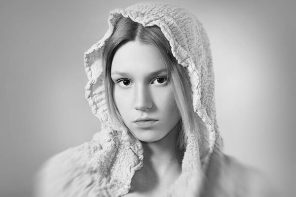 Black and white photo of natural girl in gray scarf