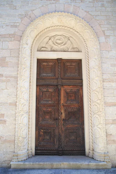 stock image Stone wall with a door in the old town, Montenegro, Kotor.