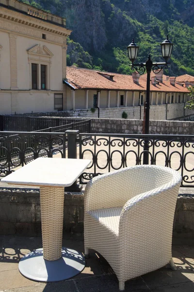 Open summer cafes in the background of mountains, Kotor, Montenegro.