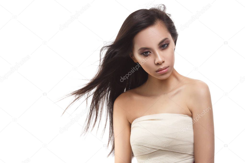 Beauty portrait of a cute asian girl isolated on white background.