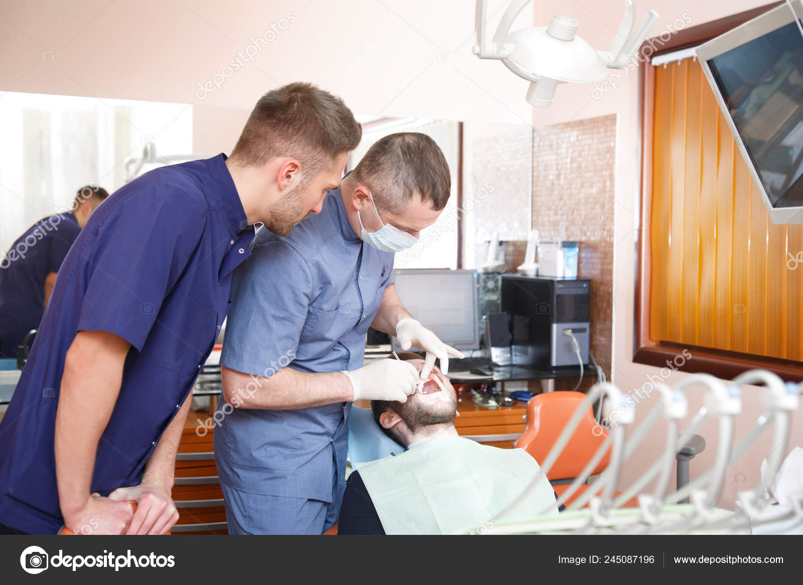 Dentist Assistant Working Patient Dental Office Stock Photo