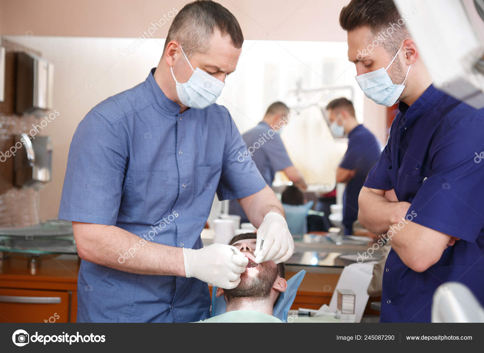 Dentist Assistant Working Patient Dental Office Stock Photo