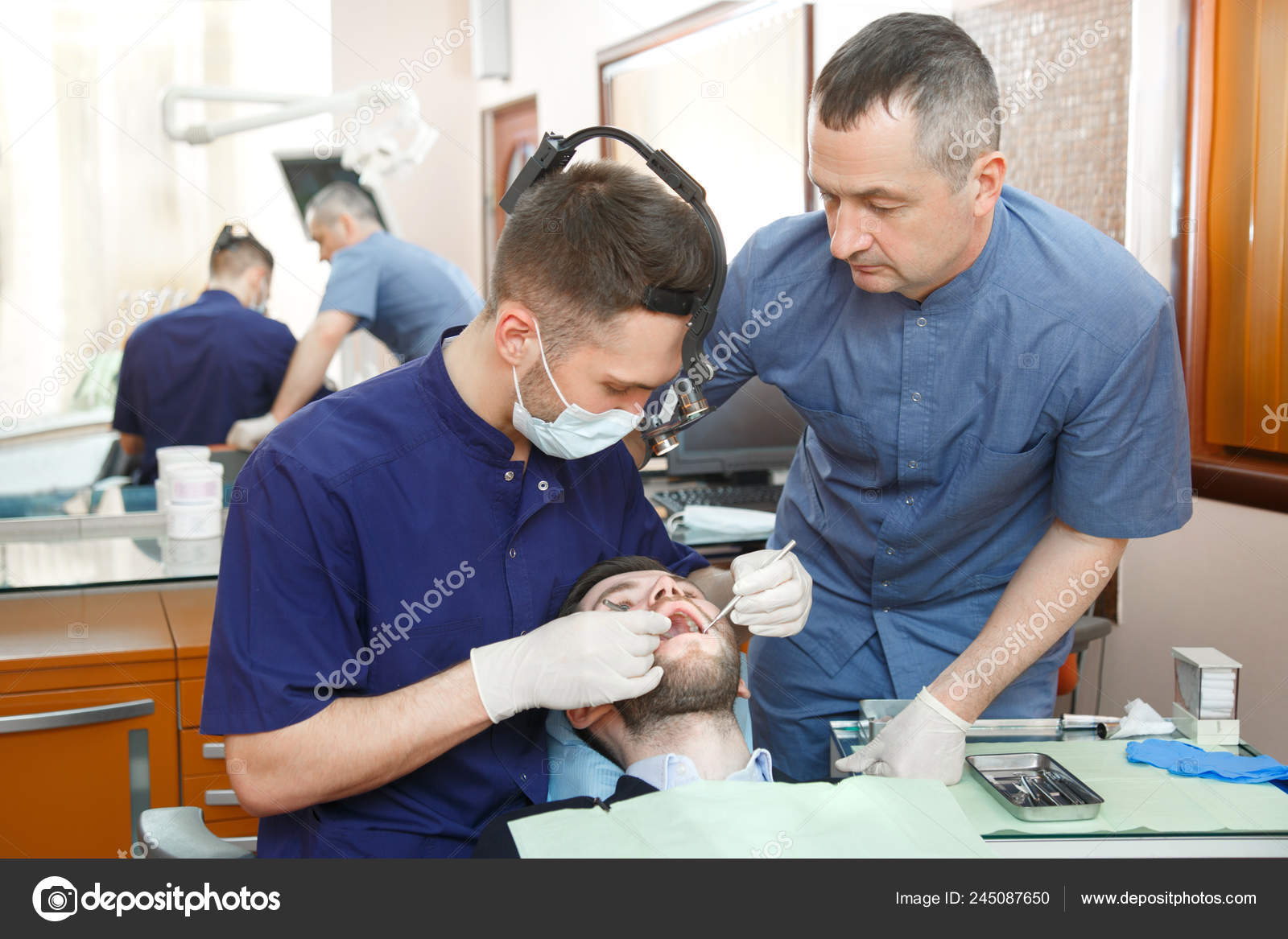 Dentist Assistant Working Patient Dental Office Stock Photo