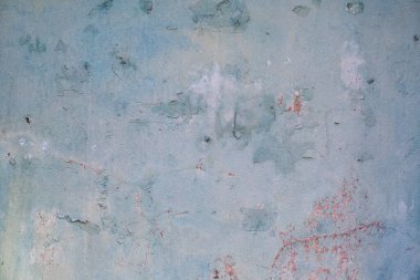 Yumuşak mavi renkli eski alçıyla boyanmış desen arkaplanı.