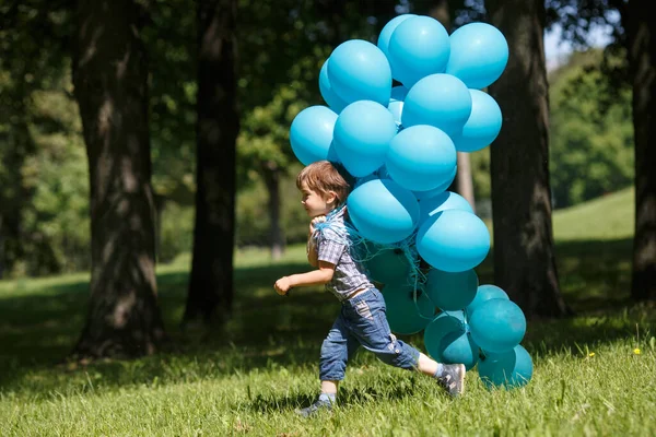 Little Boy Runs Park Huge Bunch Blue Balloons — Stock Photo, Image