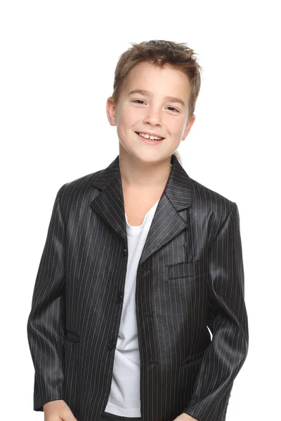 Μικρό Χαριτωμένο Χαμογελαστό Αγόρι Ένα Σακάκι Απομονωμένο Λευκό Φόντο — Φωτογραφία Αρχείου
