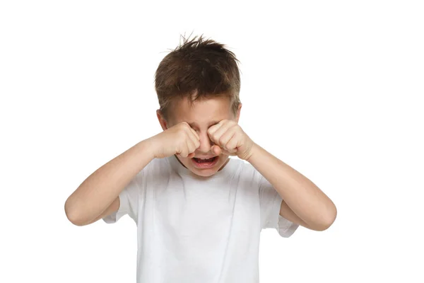 Crying Little Boy White Shirt Wipes His Tears His Fists — Stock Photo, Image