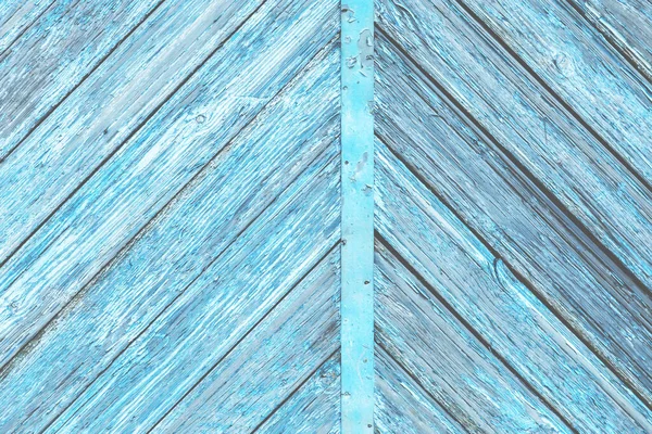 Blå färg gamla trä diagonal till båda sidor plankor med skalade färg bakgrund — Stockfoto