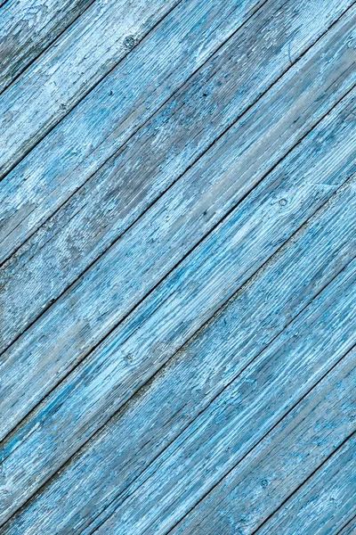 Blå färg gamla trä stora diagonala plankor med skalade färg bakgrund — Stockfoto