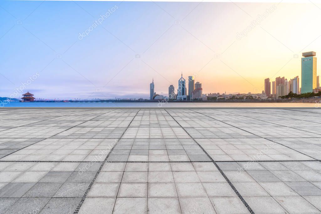 Qingdao city skyscrapers with empty square floor tiles
