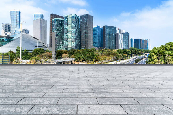 Blue sky, empty marble floor and skyline of Hangzhou urban archi