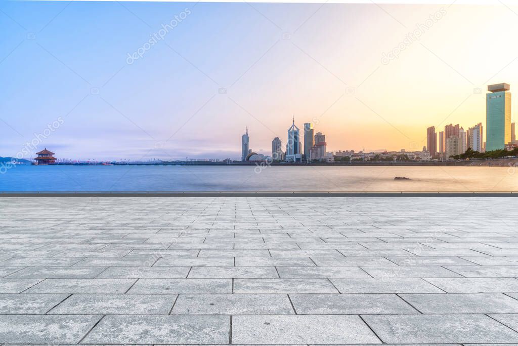 The empty marble floors and the skyline of Qingdao's urban build