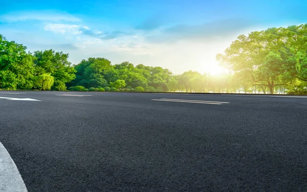 Highway Asphalt Pavement and Natural Landscap