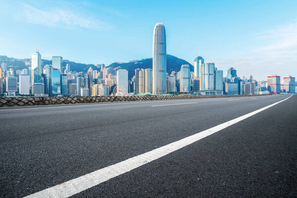 Road and skyline of modern urban architecture in Hong Kon