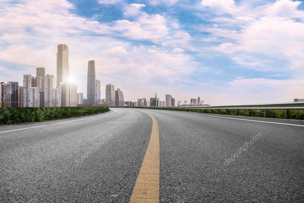 Road pavement and Guangzhou city buildings skyline