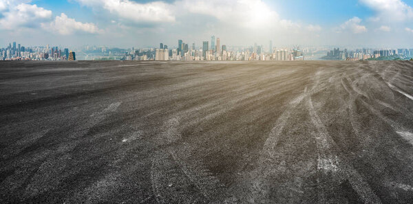 Road pavement and Chongqing urban architecture skyline