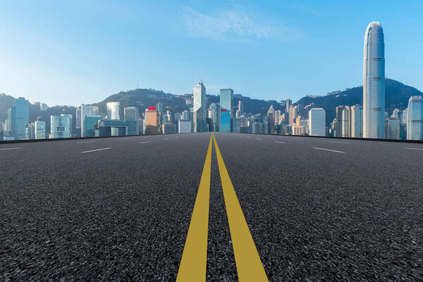 Road and skyline of modern urban architecture in Hong Kon