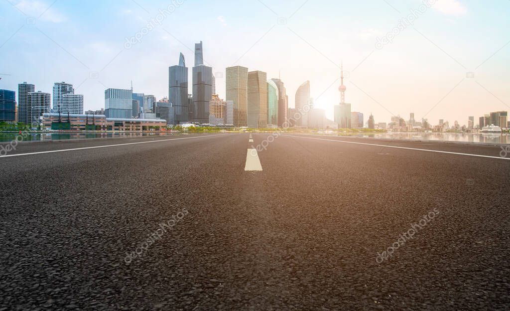 Empty Asphalt Road Through Modern City of Shanghai, Chin