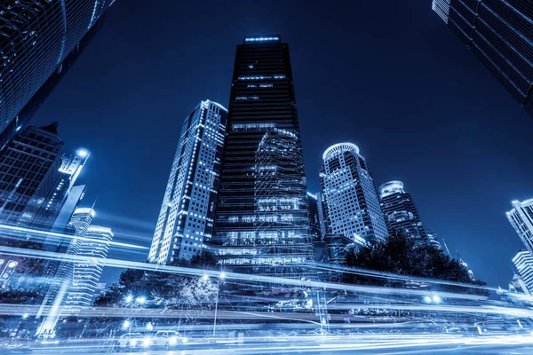 the light trails on the modern building background 