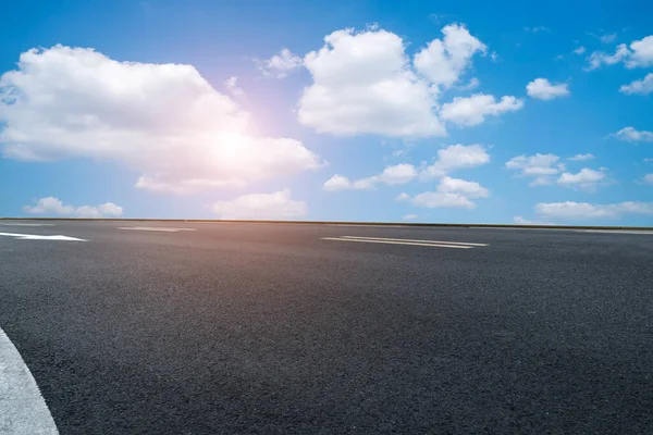 Asphalt road and sky