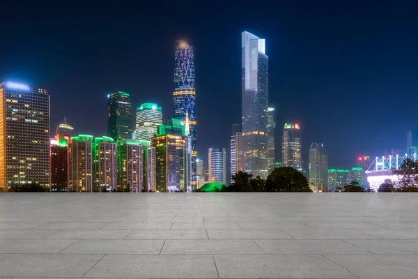 Urban skyscrapers with empty square floor tiles