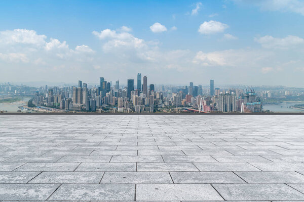 Urban skyscrapers with empty square floor tiles