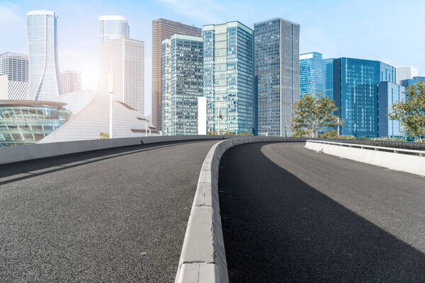 Urban road asphalt pavement and skyline of Hangzhou urban constr