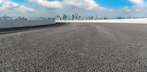 Road pavement and Chongqing urban architecture skyline