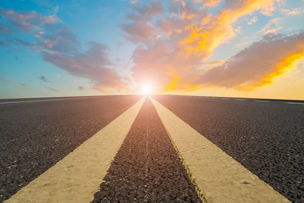 Asphalt road and sky