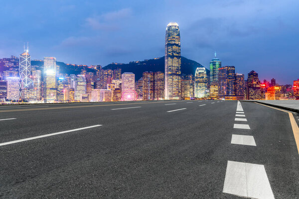 Road surface and urban architectural landscape skyline