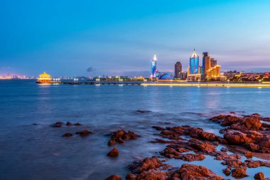 Qingdao's beautiful coastline and architectural landscap clipart