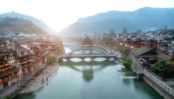 Folk houses along the river in the ancient city of Phoenix, Huna