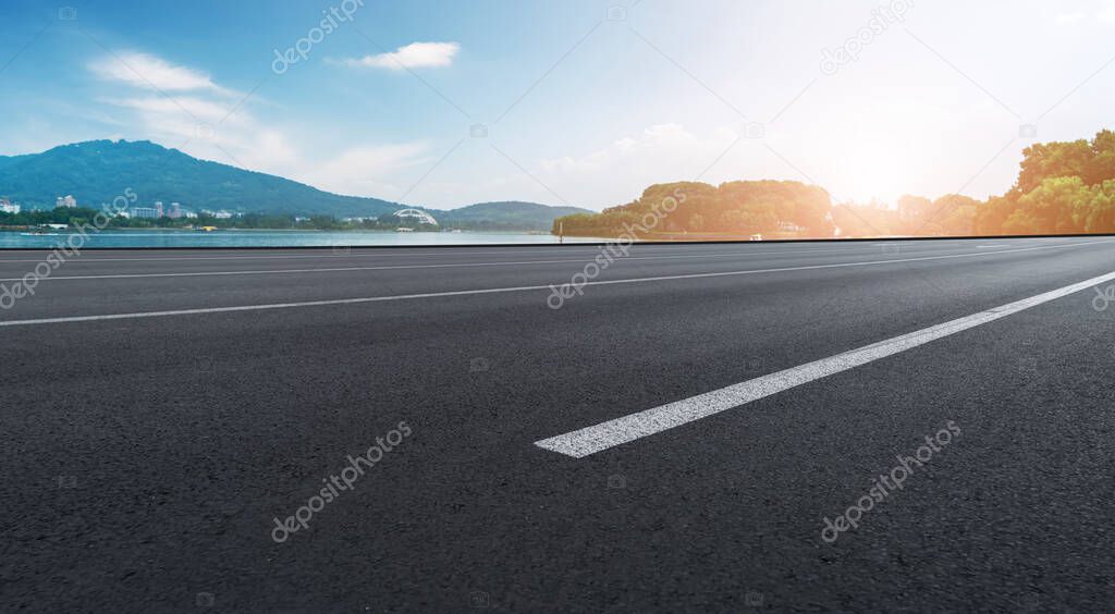 Road surface and urban architectural landscape skyline