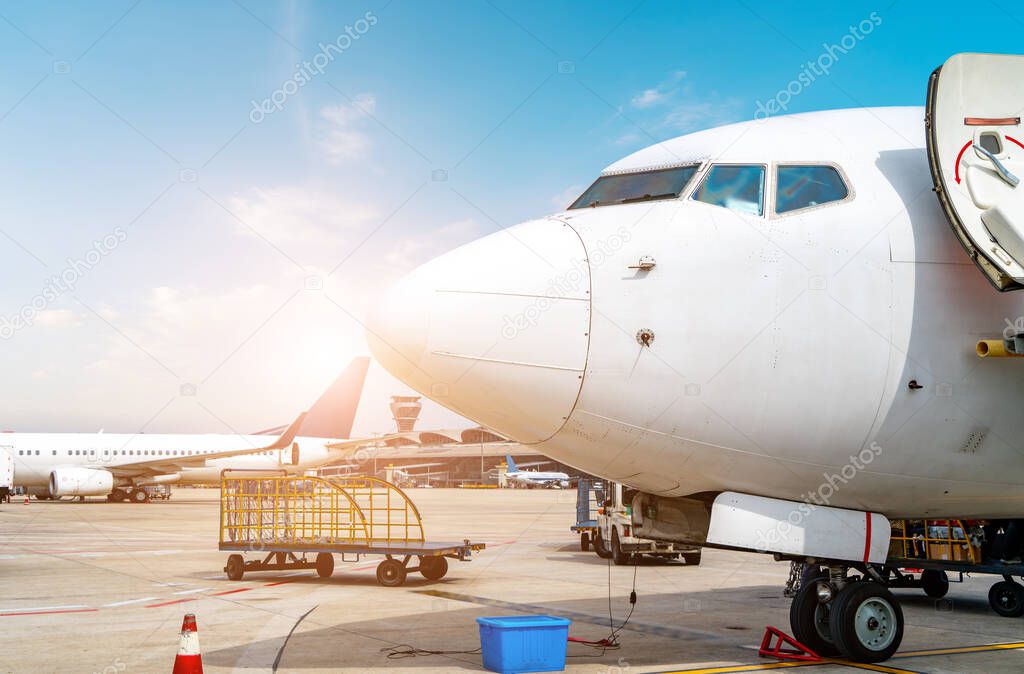 Airport runway apron and passenger aircraft