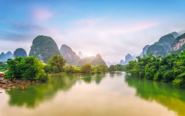 Yu Long river and Karst mountain landscape in Yangshuo Guilin, C clipart