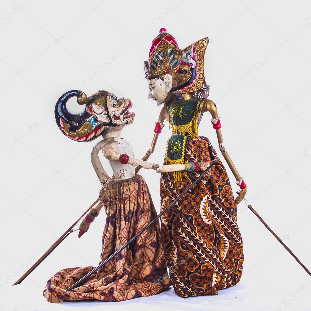 Two female  javanese dolls in emotional scene traditional dress