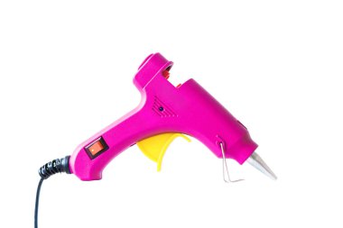 Pembe yapıştırıcı tabancası beyaz arkaplanda izole edilmiş..