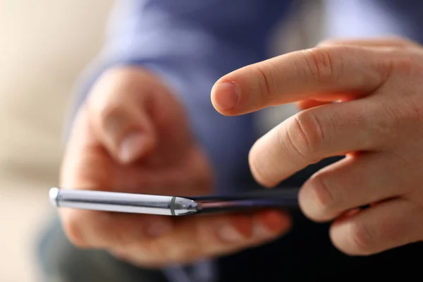 Businessman arm using modern cell phone closeup — Stock Photo, Image