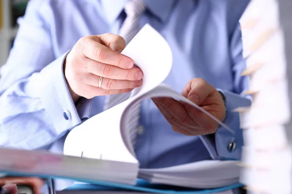 Clerk arm bend over pages in pile of documents closeup — Stock Photo, Image