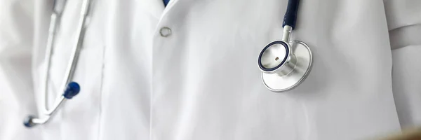 Stethoscope head at GP in white coat chest — Stock Photo, Image