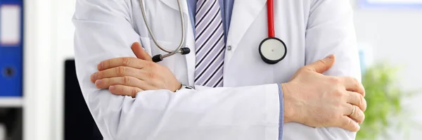 Male medicine doctor hands crossed on his chest — Stock Photo, Image